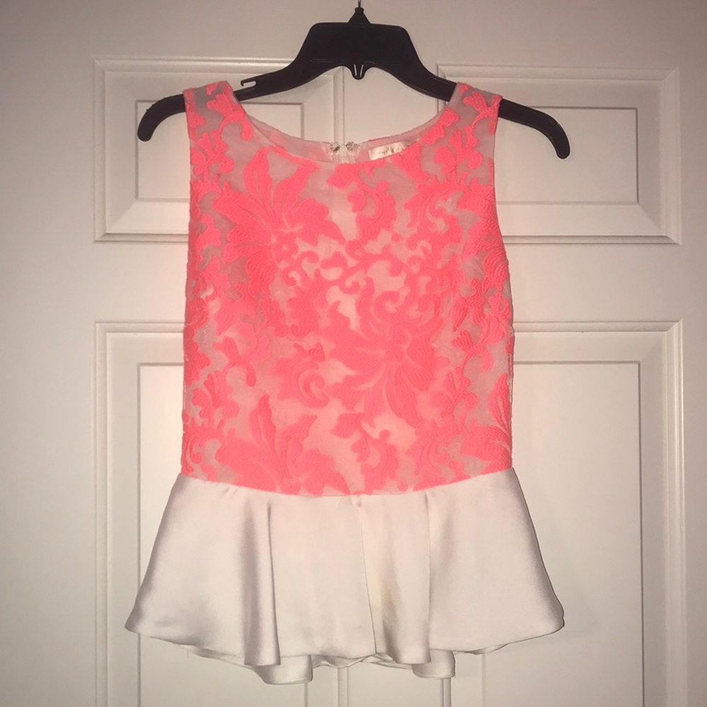 White and coral peplum top. Lightly worn.